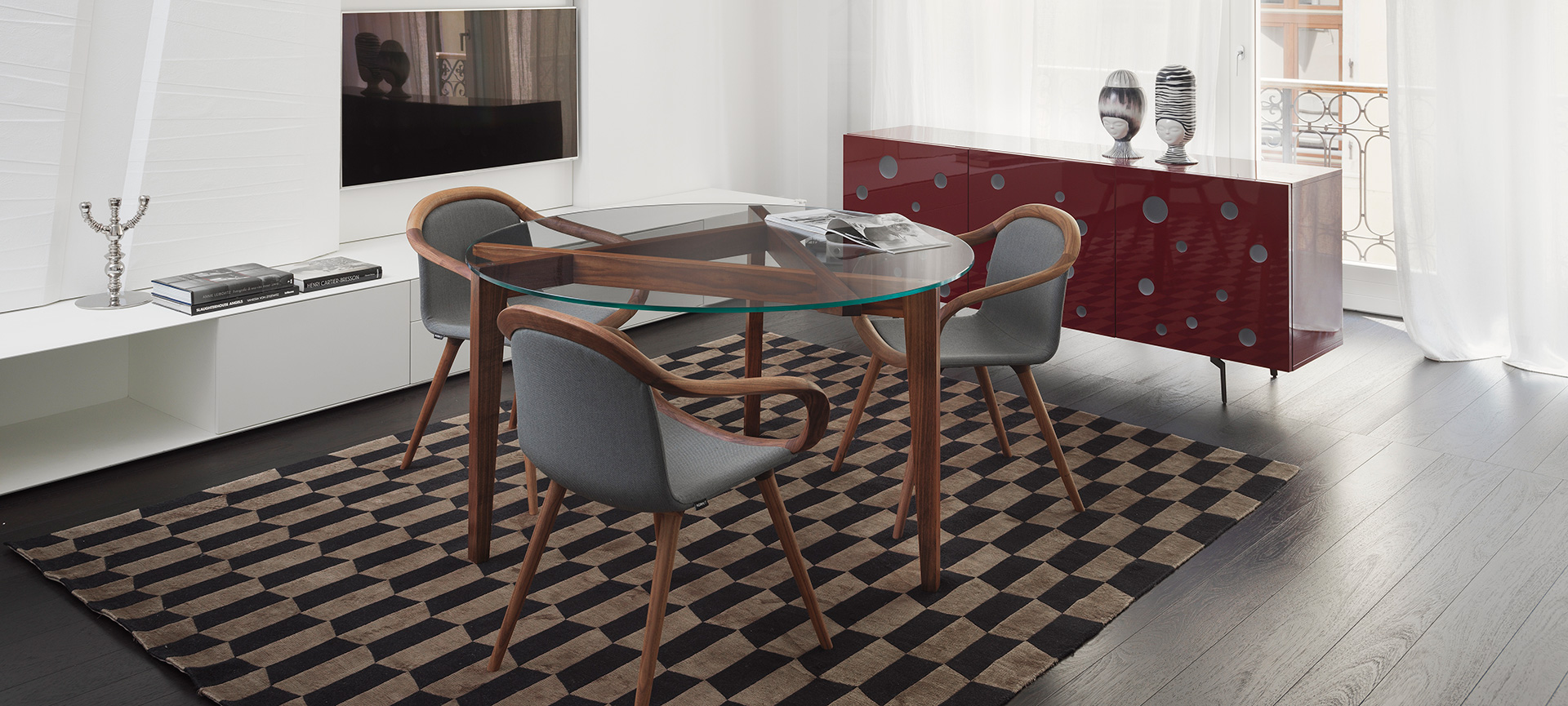 Dining room with walnut Autoreggente table and red Polka Dots sideboard