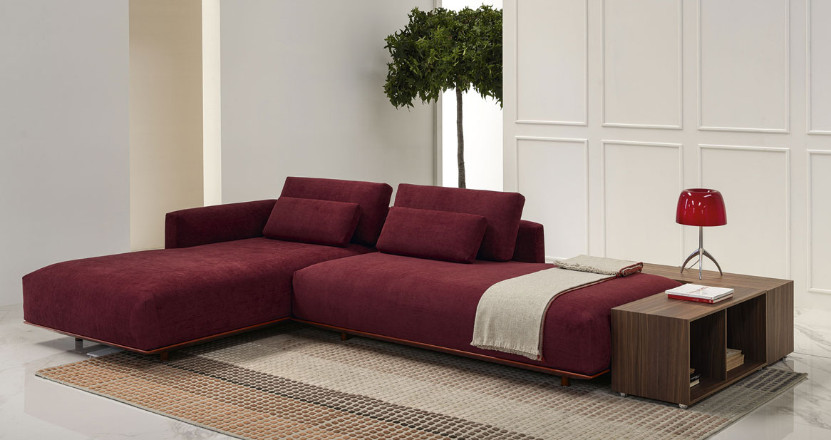 Red Billie sofa with chaise-longue in a modern living room